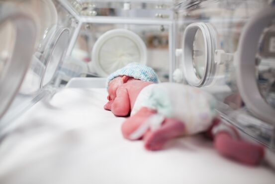 baby in incubator